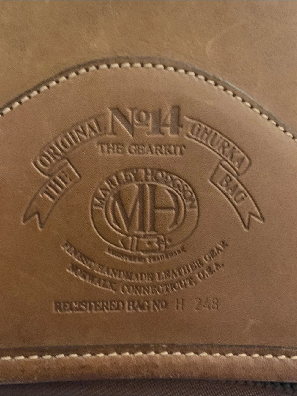 The Sak Brown Leather Garment Bag Panel with Embossed Logo